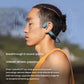 Man wearing blue Shokz OpenRun Pro bone-conduction headphones outdoors with sound wave graphics