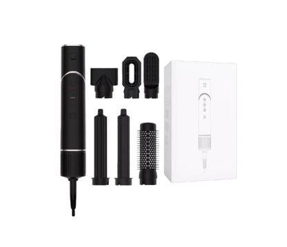 Black 6-in-1 Ultra Styler hair tool shown with full set of attachments including concentrator, diffuser, brush, curling rod, and straightener. Ideal for fast, professional-looking hairstyles.