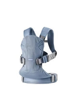 Light blue BabyBjörn Carrier One Cotton baby carrier with breathable cotton fabric, wide waist belt, and ergonomic support for comfortable babywearing.