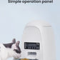 Black-and-white cat eating from white DOGNESS Mini feeder, highlighting foolproof button panel and clear LCD display.
