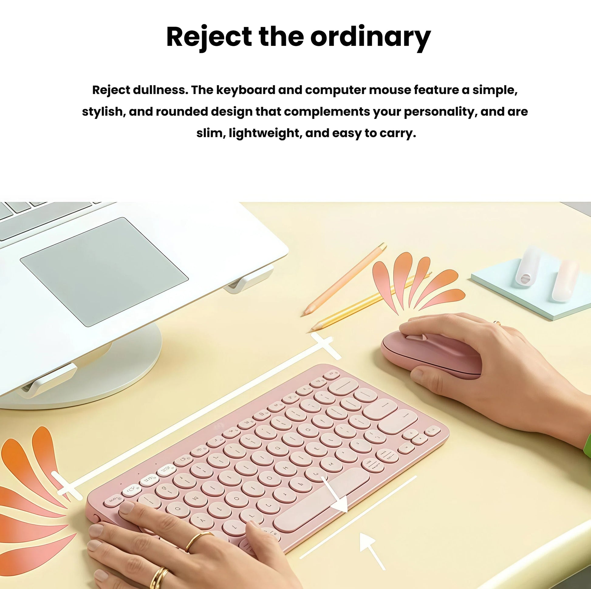  Lifestyle photo of the rose Pebble 2 Combo in use on a pastel desk with a laptop, notebooks, and pencils, emphasizing its lightweight, portable design.