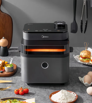 The Midea 7.3L Air Fryer displayed on a stylish kitchen countertop surrounded by fresh ingredients, showcasing its elegant design and suitability for everyday healthy cooking.
