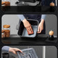  A three-panel image demonstrating the simple cleaning process for the Midea Air Fryer, showing the removable non-stick basket, a hand easily wiping the interior, and the grill plate being rinsed clean.