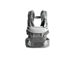 Studio shot of Nuna Cudl Clik Carrier in grey color—highlighting sleek lines, magnetic fasteners, padded waist belt, and premium materials. Designed for comfort, style, and safety from birth.