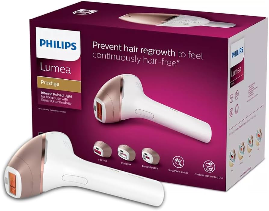 Image of a handheld IPL (Intense Pulsed Light) hair removal device in a sleek white and rose gold design. The device comes with three interchangeable attachment heads for different body areas, each designed with specialized treatment windows. The attachments are color-coded for easy identification and suited for face, body, and precision areas
