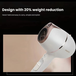 Close-up of the lightweight Philips Prestige hair dryer with 20% reduced weight, designed for comfortable handheld use and easy portability.