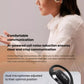 Professional woman using Shokz OpenFit open-ear headphones with dual microphones and AI-powered noise reduction for crisp calls during meetings.